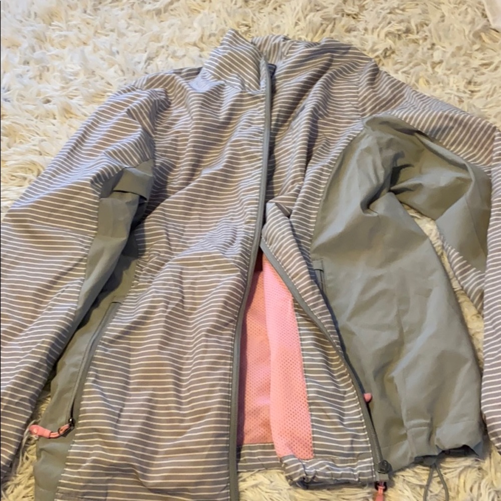 Gray and white striped windbreaker